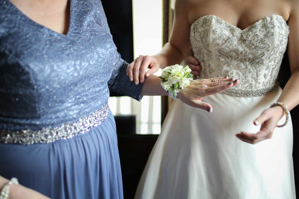 Should the bride or the groom's mother wear a corsage